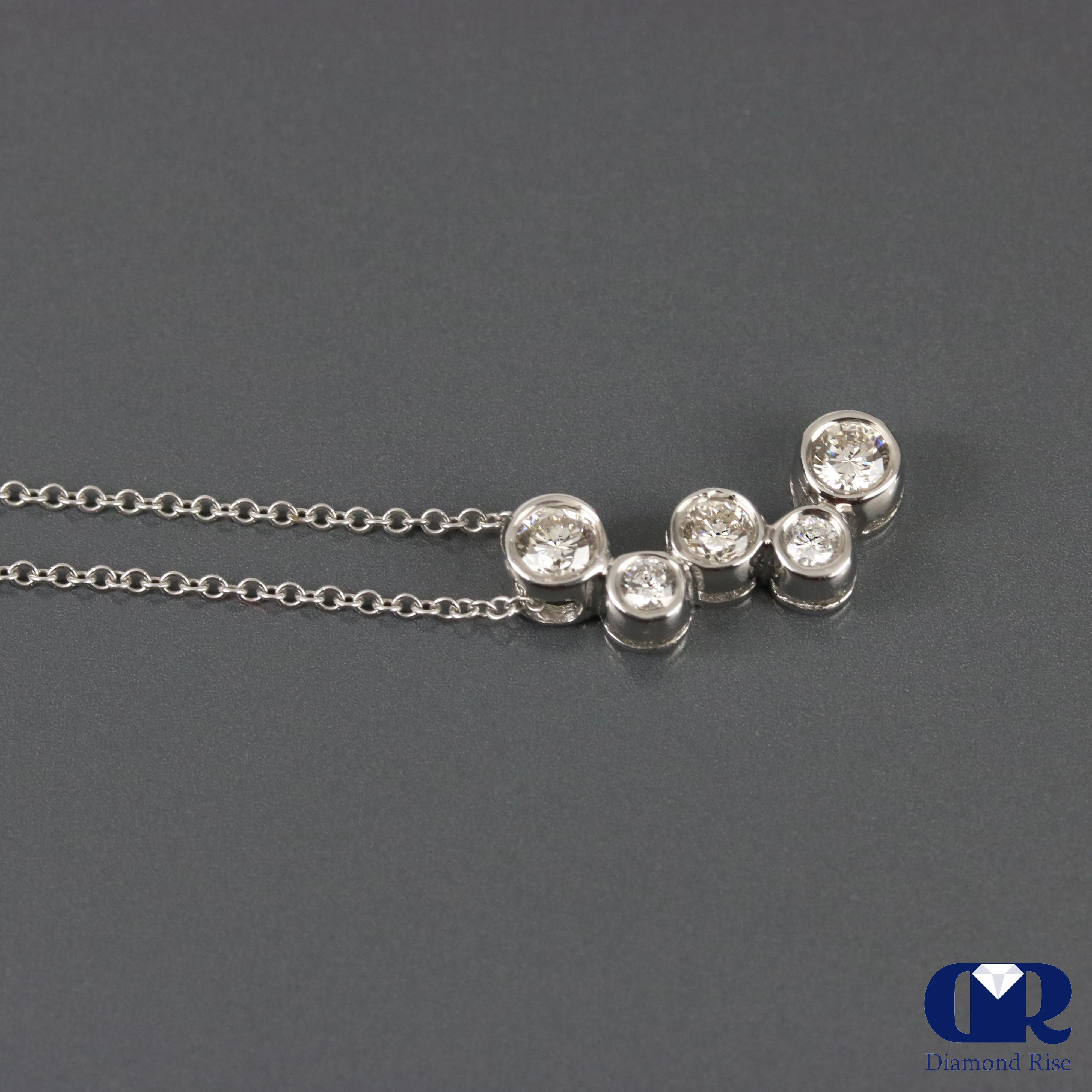 0.65 Round Cut Diamond Pendant In 14K White Gold With 16"