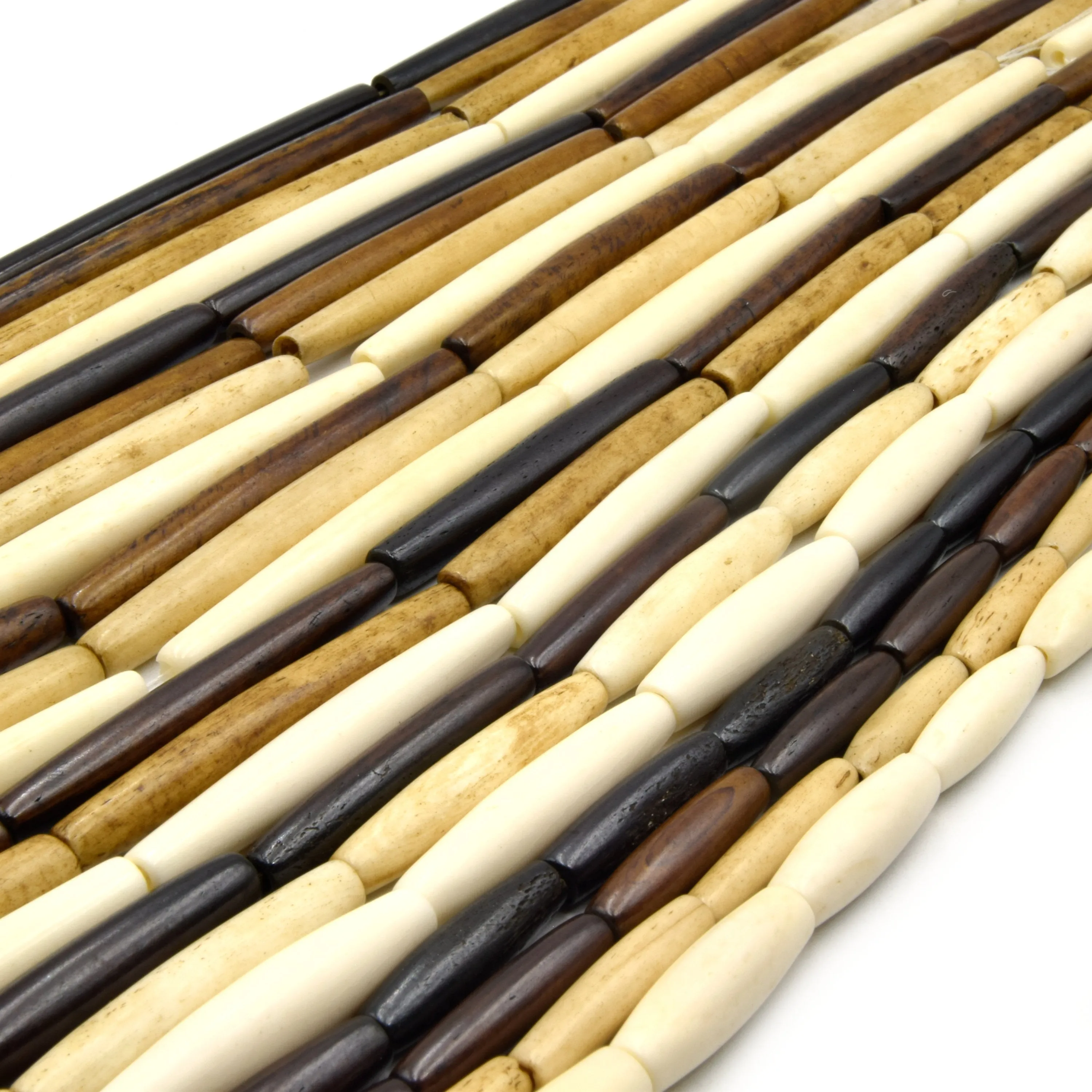 Bone Beads - Ox Bone Tube Hair Pipe Beads in Sizes 1 inch to 4 inches, Available in White, Brown, and Black.