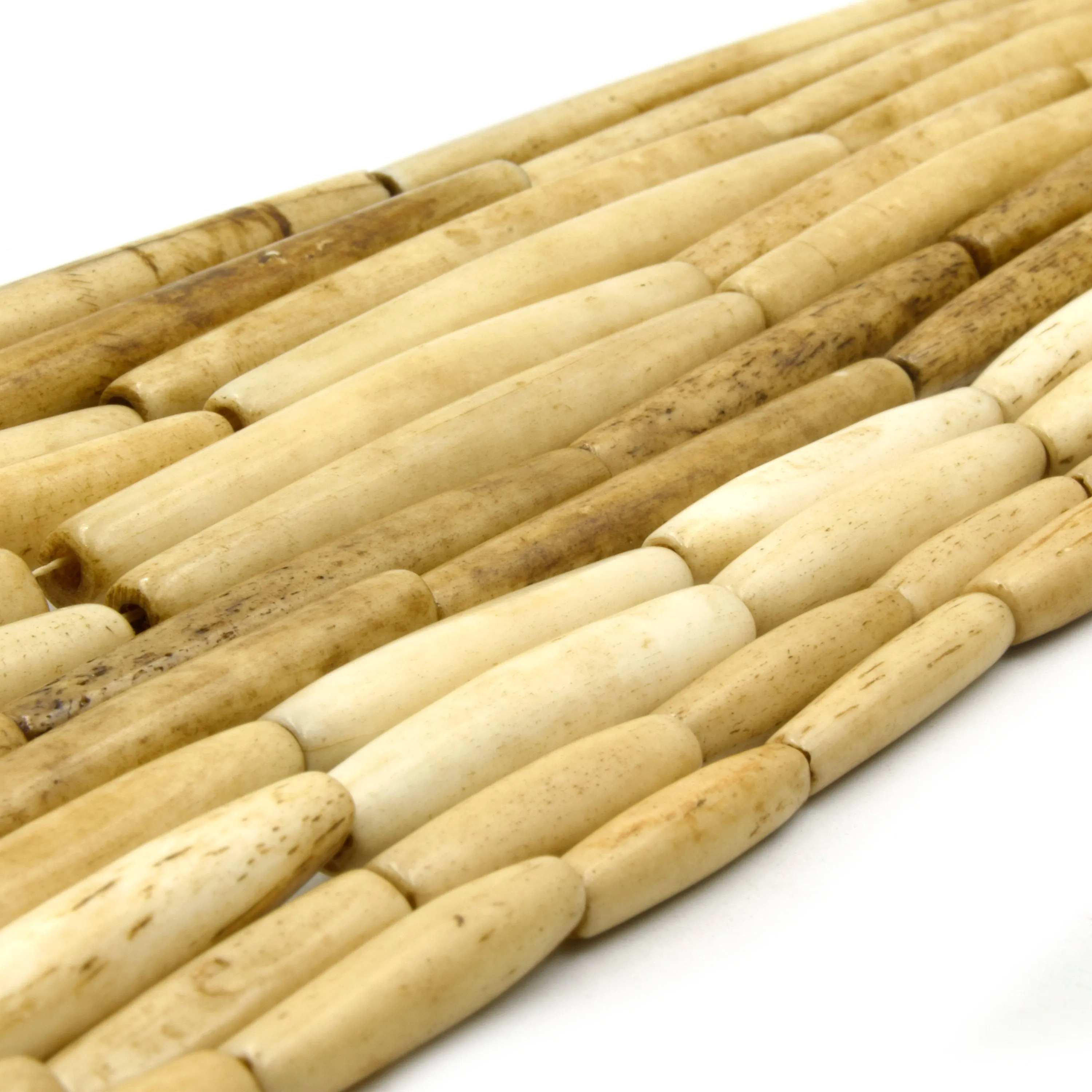 Bone Beads - Ox Bone Tube Hair Pipe Beads in Sizes 1 inch to 4 inches, Available in White, Brown, and Black.