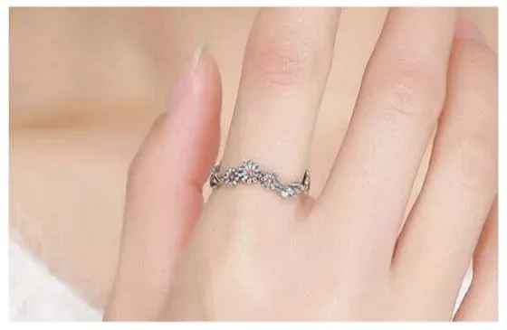 Daisy Delight: Sterling Silver Orange Cubic Zirconia Ring