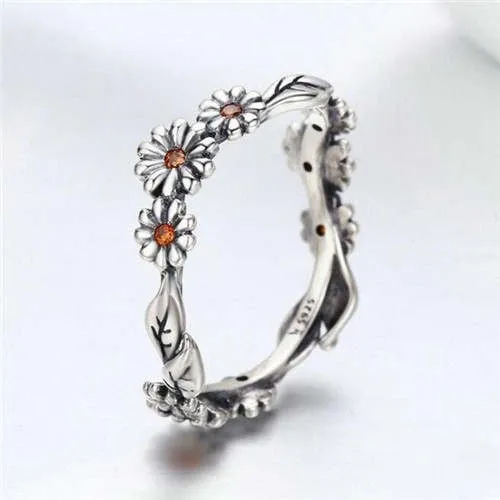 Daisy Delight: Sterling Silver Orange Cubic Zirconia Ring