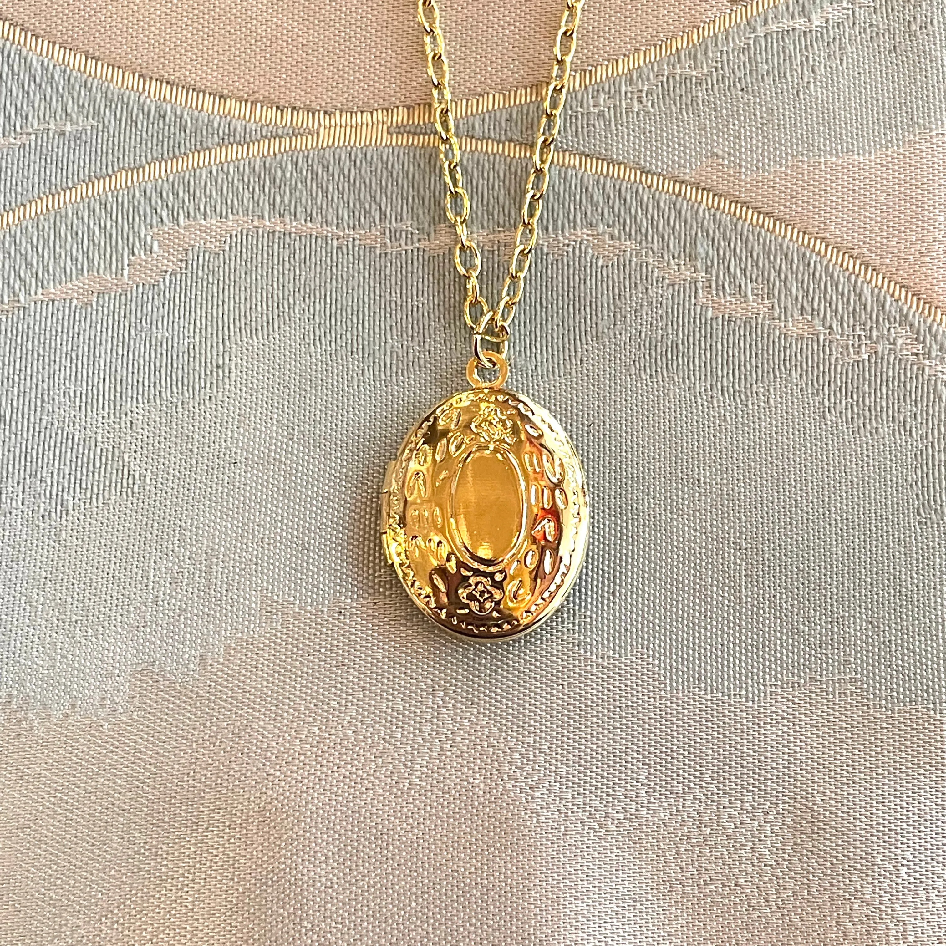 Delicate Gold Embellished Oval Locket Necklace