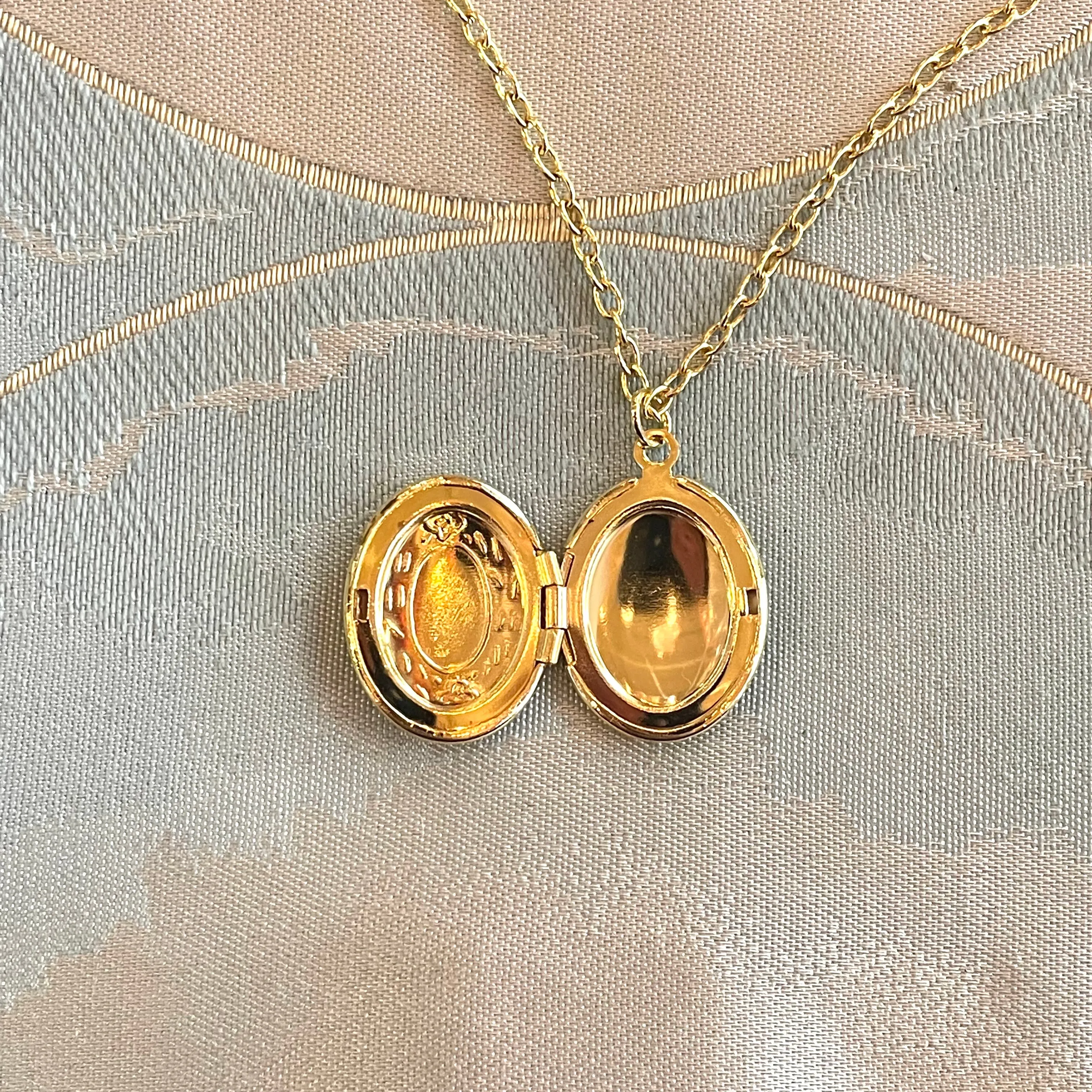 Delicate Gold Embellished Oval Locket Necklace