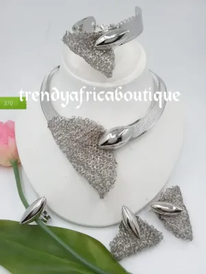 Elegant Silver set: Elegant Dubai 4pcs 18k electroplated choker necklace, matching earrings, bangle & adjustable ring. hypoallergenic plating. Sold as a set and price is for the set. As shown in display photo.