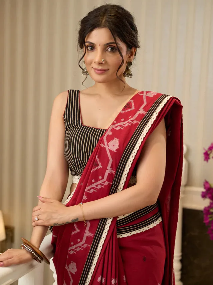 Jamdani saree in regal red with intricate motifs and lace borders