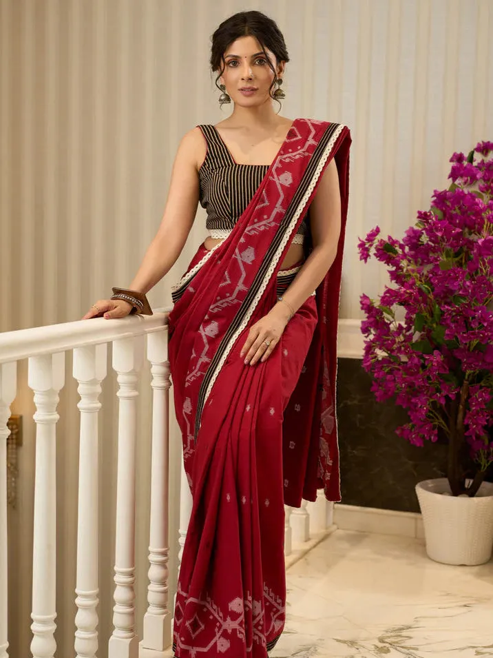 Jamdani saree in regal red with intricate motifs and lace borders